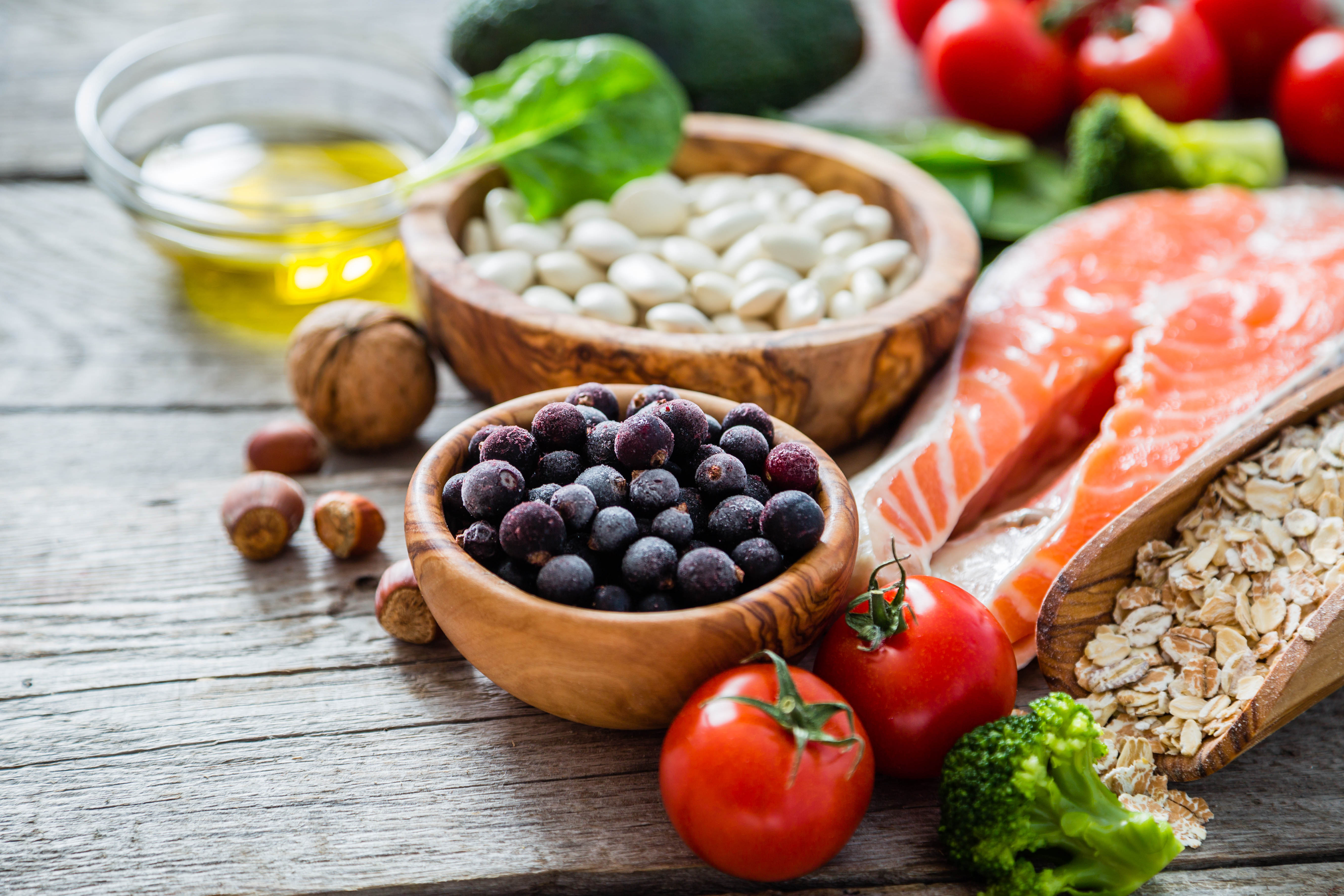 Foods that are part of a healthy diet including - fish, nuts, oils, berries, vegetables, fruit